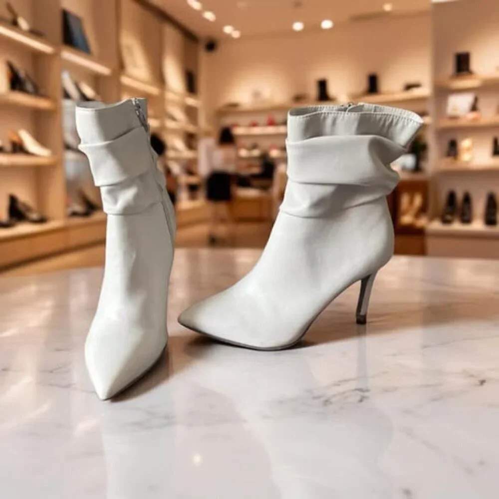 MARC FISHER IVORY HEELED BOOTIES